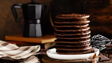 stack of chocolate pancakes DCGHY39 scaled